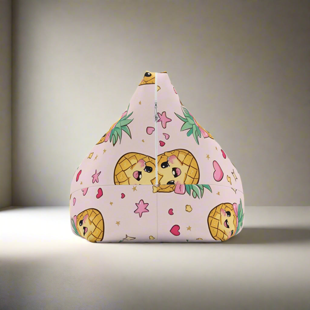 A child sitting on a bean bag chair with a pink background and a design that includes pineapples and other playful elements.