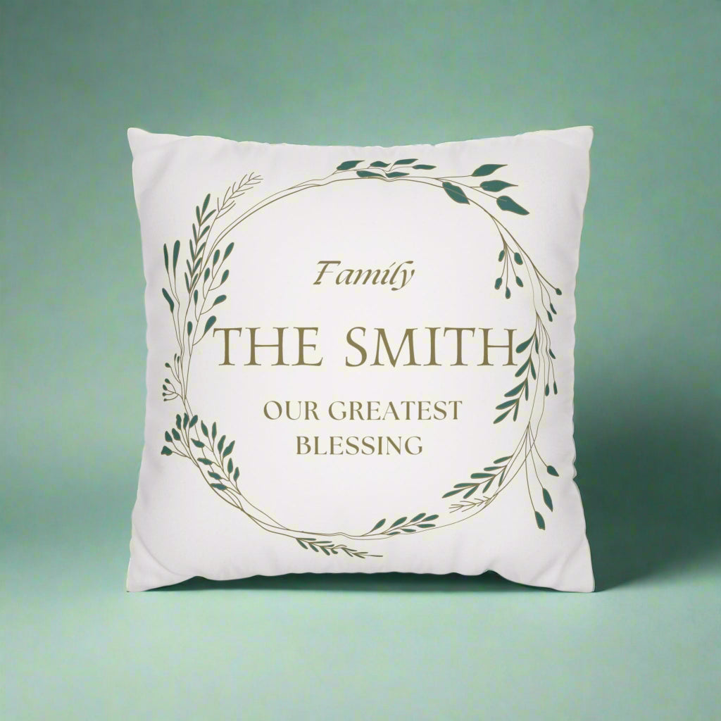 Decorative pillow with 'Family THE SMITH OUR GREATEST BLESSING' text on a green background