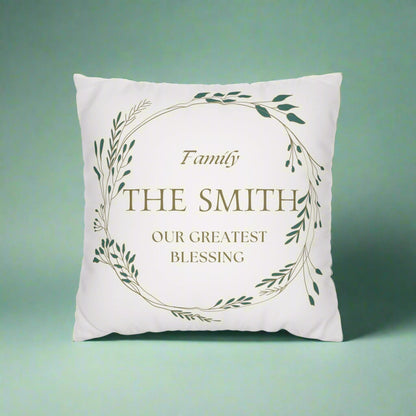 Decorative pillow with 'Family THE SMITH OUR GREATEST BLESSING' text on a green background