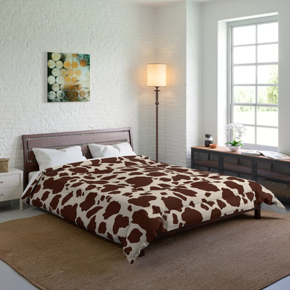 Cow Print Cozy Dorm Comforter in a soft aesthetic dorm room — soft natural lighting, warm layered styling by HomeStylesPlus