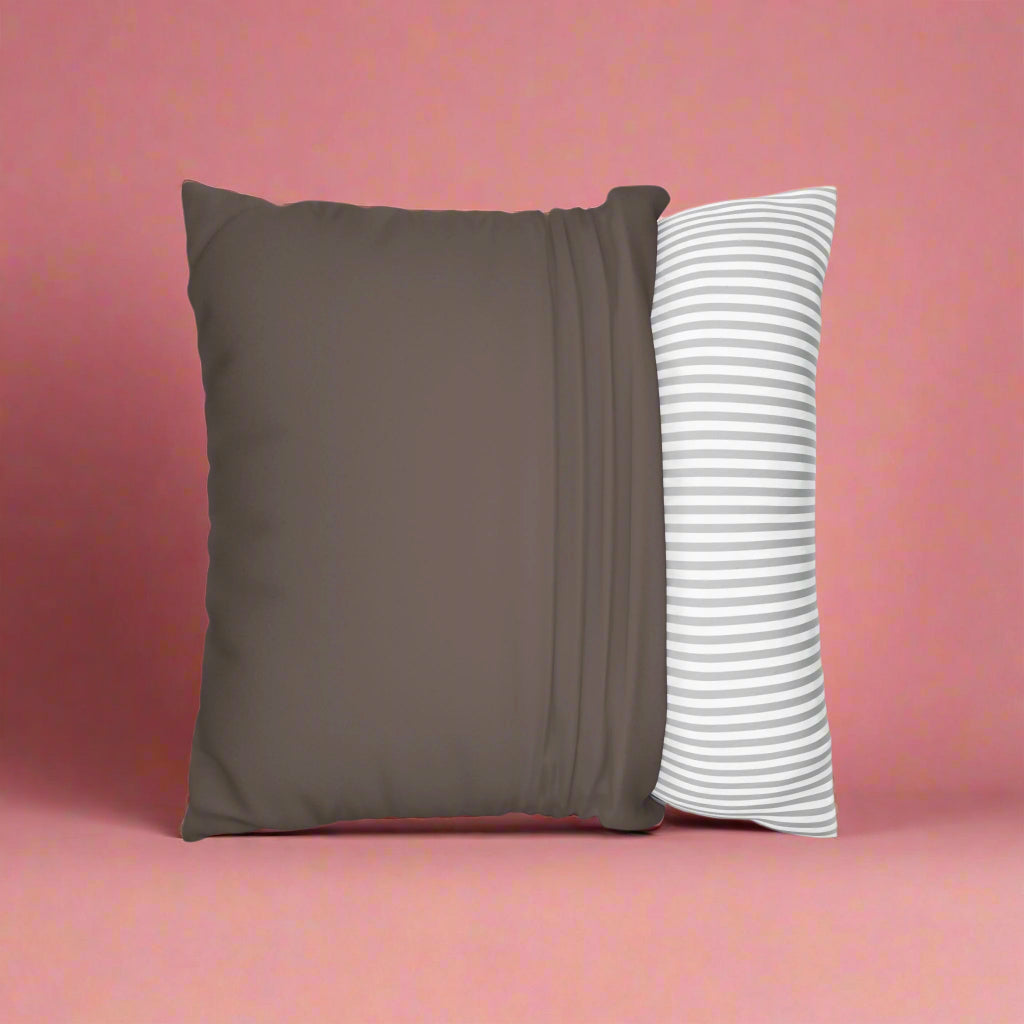 Brown pillow and white pillow with gray stripes on a white background