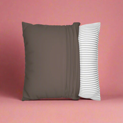 Brown pillow and white pillow with gray stripes on a white background