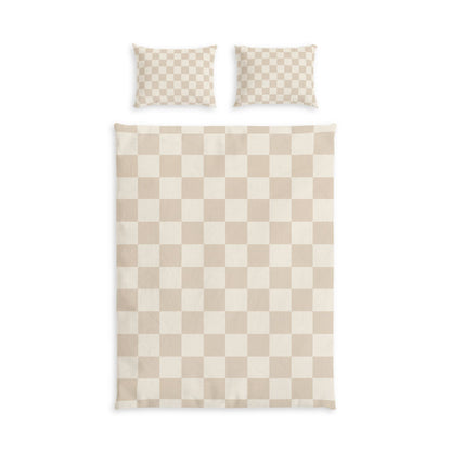 Beige checkerboard cotton bed set with neutral duvet cover and matching shams in a cozy, modern bedroom setting