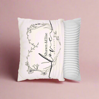 Decorative pillow with artistic design and text on a white background