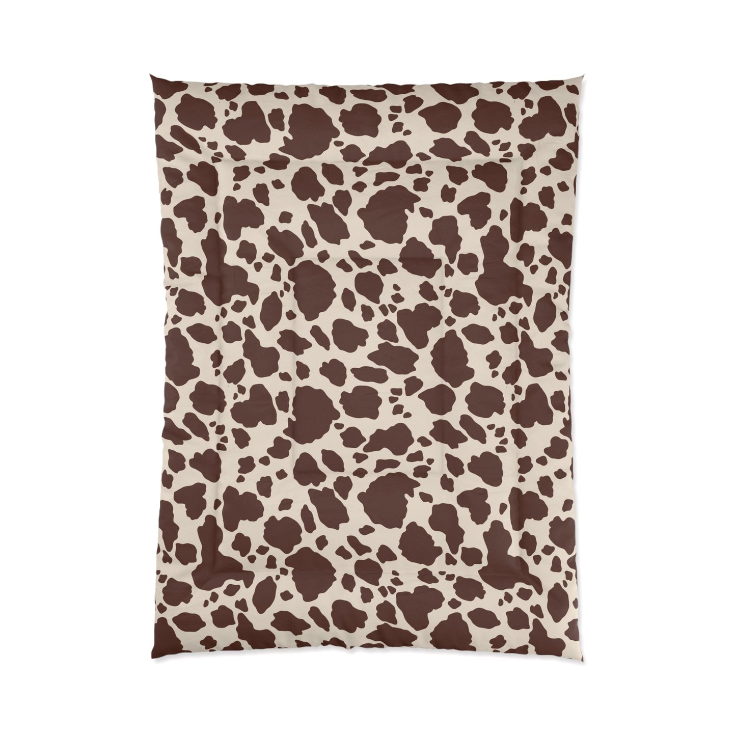 Cow Print Cozy Dorm Comforter in a soft aesthetic dorm room — soft natural lighting, warm layered styling by HomeStylesPlus