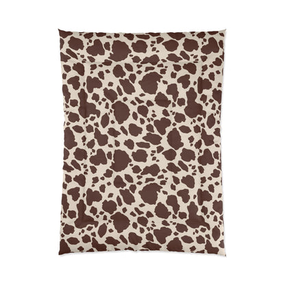 Cow Print Cozy Dorm Comforter in a soft aesthetic dorm room — soft natural lighting, warm layered styling by HomeStylesPlus