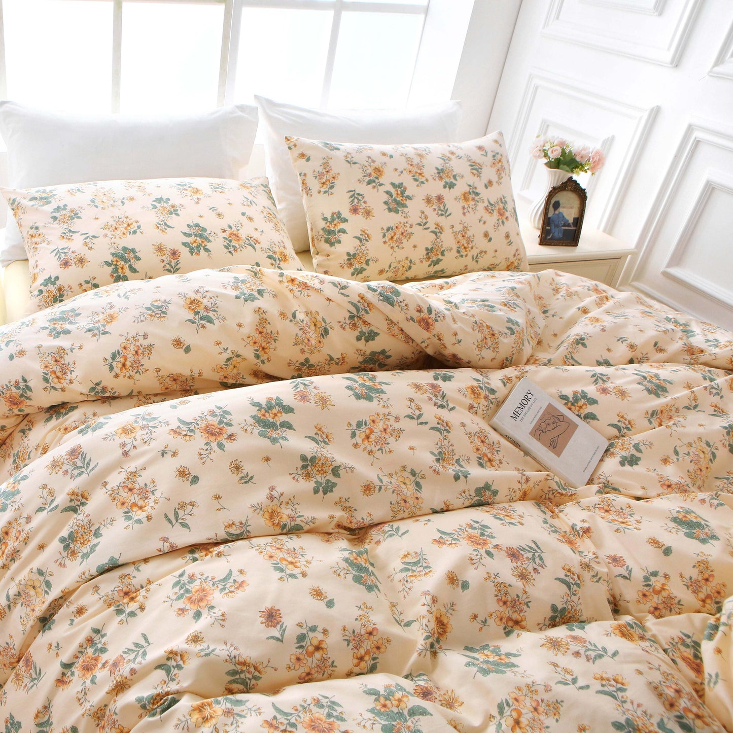 Vintage floral cotton duvet set on bed, featuring kawaii-inspired design with coordinating pillowcases and flat sheet.