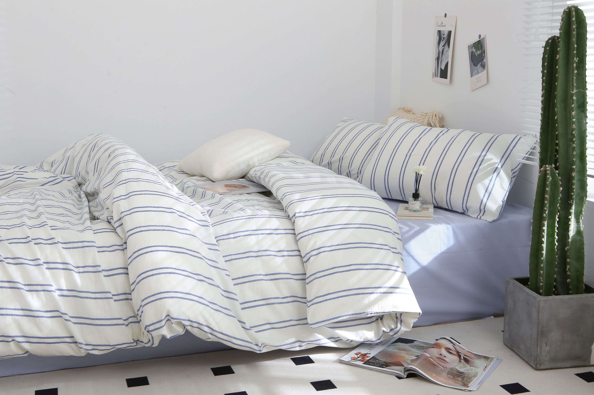 Blue Stripe Bedding Set with soft washed cotton, featuring duvet cover, bed sheet, and pillowcases in chic style.