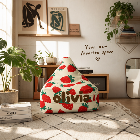 Strawberry bean bag chair cover with personalized name in a cozy kids bedroom setting