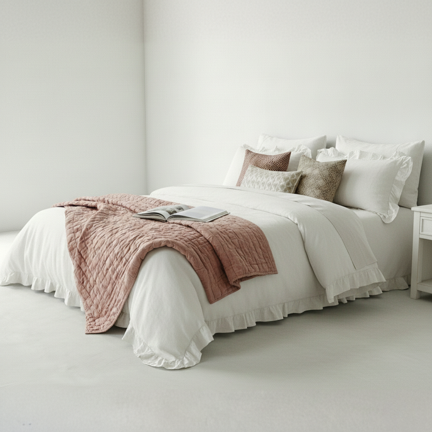 Close up of white washed cotton fabric showing soft ruffled edge and breathable weave