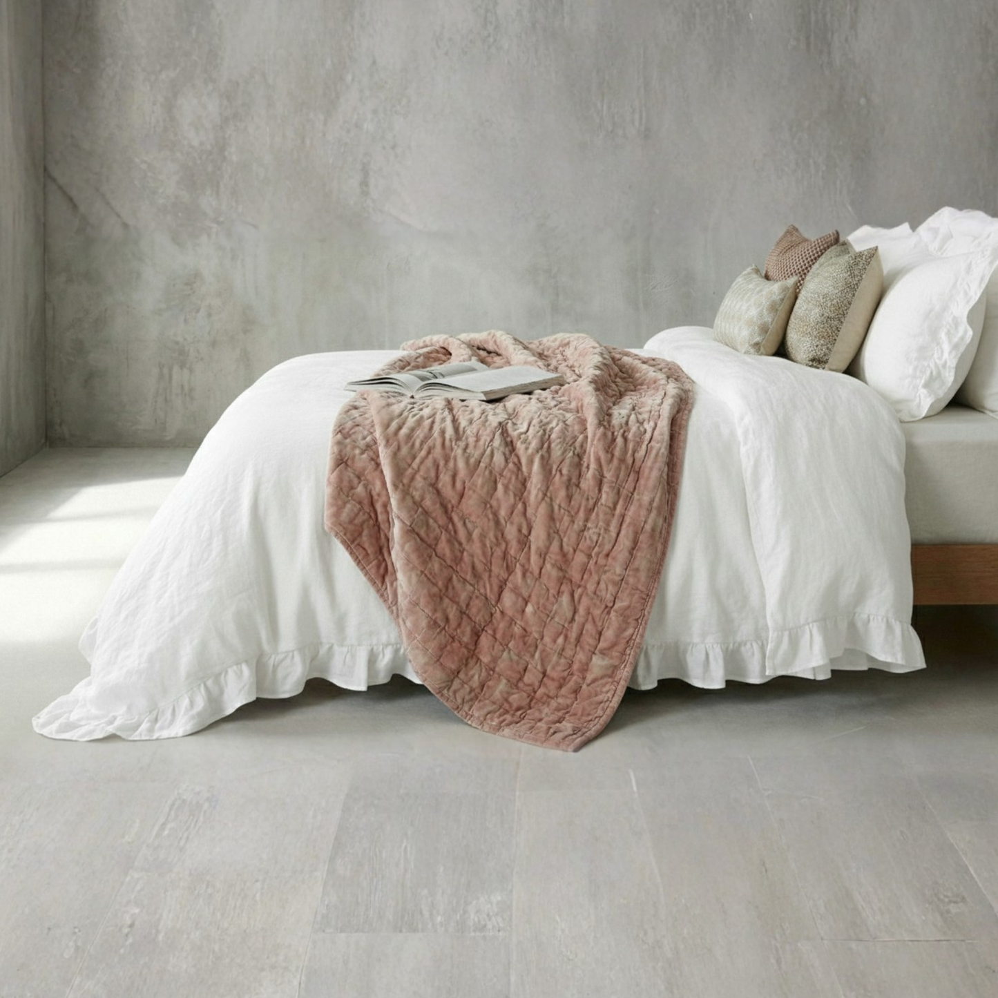 Minimalist white farmhouse bedroom decor with textured ruffled bedding