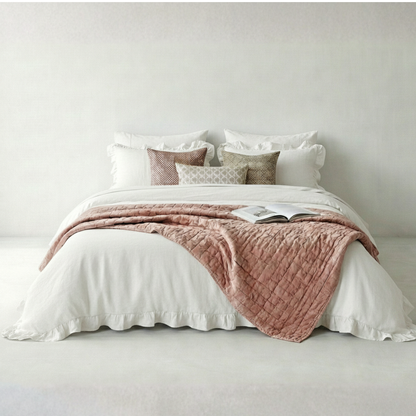 White washed cotton ruffled duvet set in a bright cottagecore bedroom